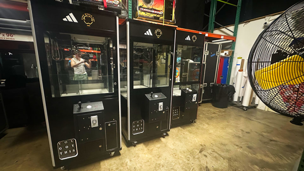 3 claw machines wrapped for Adidas Stores